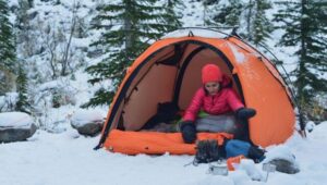 Woman winter camping